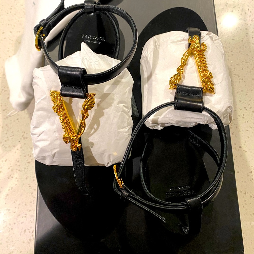 Brand new black and gold Versace sandals